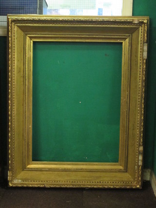 A 19th Century gilt plaster and wood picture frame 33" x 24"
