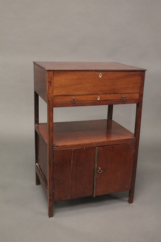 A 19th Century rectangular mahogany enclosed wash stand with hinged lid, the base fitted a drawer above recess and with  cupboard beneath, raised on square tapering supports 21"