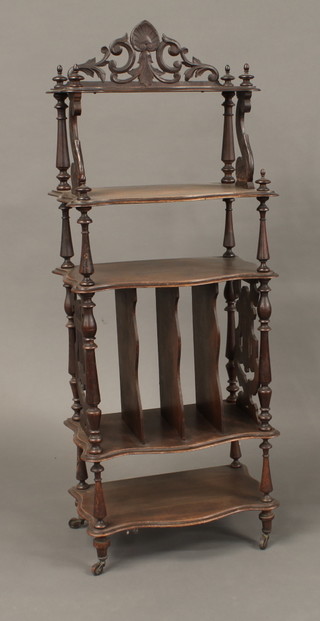 A Victorian shaped mahogany 3 tier Canterbury with pierced raised back, the base incorporating a 4 division Canterbury 20"