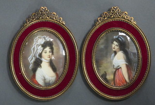 A pair of portrait miniatures "Standing Lady and Bonnetted Lady" 3" contained in a gilt metal and red plush frames  frame, signed T Page?, 3" oval