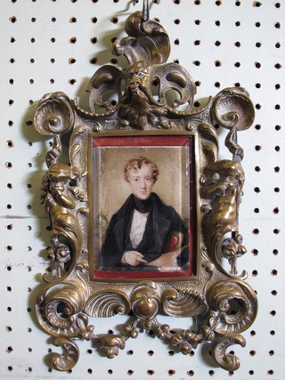 A portrait miniature "Nobleman Wearing Black Coat" contained  in a decorative gilt metal frame 4" x 3"