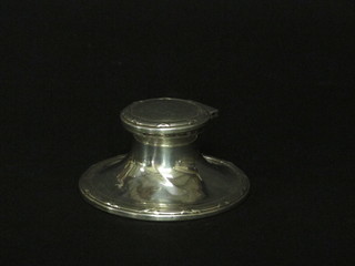 A circular silver capstan inkwell with engraved lid, marks rubbed, 3 1/2"