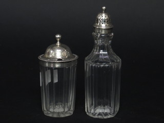 A Georgian cylindrical cut glass mustard pot with silver lid together with a panel cut glass pepper pot with silver lid