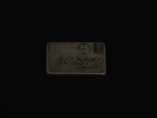 A 19th Century Sterling silver stamp box in the form of an  envelope addressed to Lieutenant E H Mowbray RN HMS Tartar,  together with small amount of paperwork regarding the ship