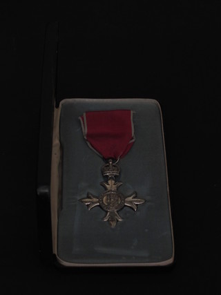 A breast badge of a Member of The Most Excellent Order of The British Empire, Second Type Civil Division, cased