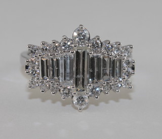 An 18ct white gold dress ring set baguette diamonds, approx 1.82ct,