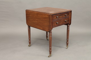A Victorian mahogany drop flap table fitted 2 drawers, raised on turned supports 24"