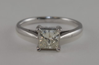 An 18ct white gold dress/engagement ring set a Princess cut diamond, approx. 1ct