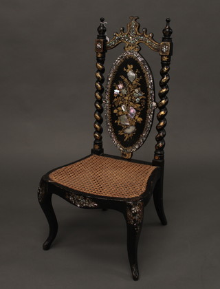 A Victorian papier mache chair inlaid mother of pearl and with  woven cane seat, raised on cabriole supports