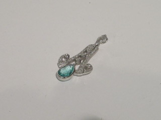 A lady's 18ct white gold pendant set a tear drop emerald and  diamond