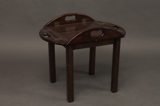 A mahogany folding Butler's tray table, 26"