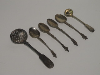 A Georgian silver fiddle pattern sifter spoon, a mustard spoon  and 4 Continental apostle spoons