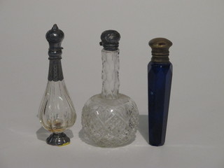 A blue faceted glass scent phial 3" and 2 glass scent bottles with silver mounts