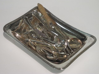 A rectangular silver plated dish together with a collection of various silver plated flatware