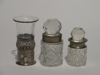 A circular glass specimen vase in a plated mount, 2 cylindrical  cut glass dressing table jars with silver mounts
