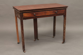 A rectangular Georgian mahogany tea table, the base fitted a  drawer, raised on square tapering supports 36"