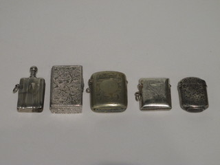 A silver vesta case, a Sterling vesta case, a plated vesta case, a white metal box with hinged lid and a plated lighter