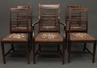 A set of 6 19th Century bar back dining chairs with upholstered  drop in seats, raised on square tapering supports with X framed  stretcher