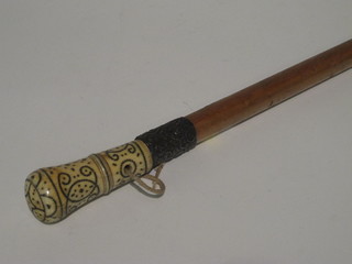 A Georgian stick with ivory terminal 3 1/2"