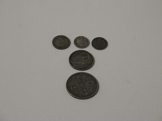 A Victorian 1887 half crown, do. shilling and 2 other coins