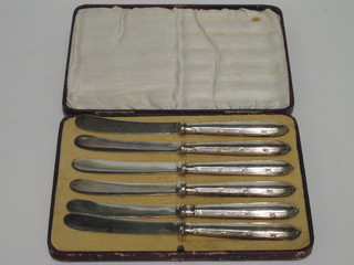 A set of 6 silver plated tea knives