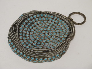 A bead work evening bag