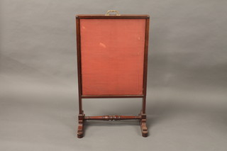 A Victorian mahogany fire screen 22"