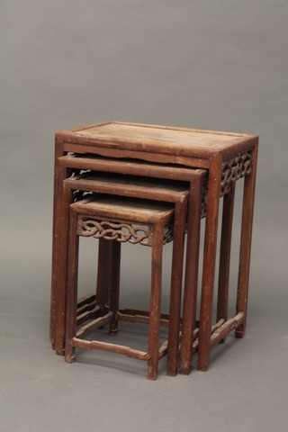 A quartetto of Oriental interfitting coffee tables 19"