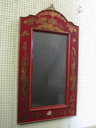 A rectangular bevelled plate wall mirror contained in a red lacquered frame 21"