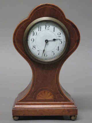 An Edwardian mantel clock with enamelled dial and Arabic numerals contained in an inlaid mahogany case   ILLUSTRATED