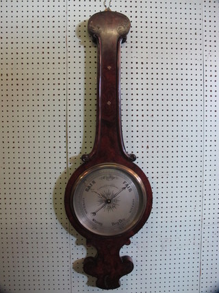 A 19th Century mercury wheel barometer with silvered dial by  Straub & Herbting contained in a walnut wheel case, missing  thermometer,
