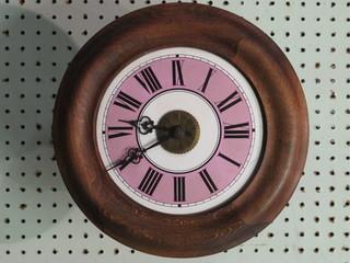 A Postman's alarm clock with enamelled dial contained in a  beech case 12"
