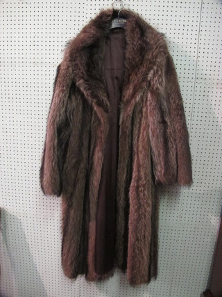 A lady's full length silver fox coat