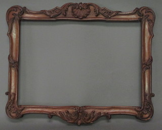 A carved mahogany frame 10 1/2" x 15"