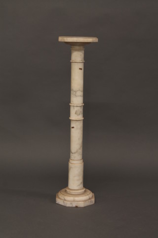 A turned white marble pedestal 37"