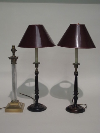 A glass and brass table lamp with Corinthian capital together with  a pair of reeded mahogany table lamps