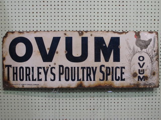 A rectangular enamelled sign for Ovum Thorley's Poultry Spice  12" x 33", some corrosion,