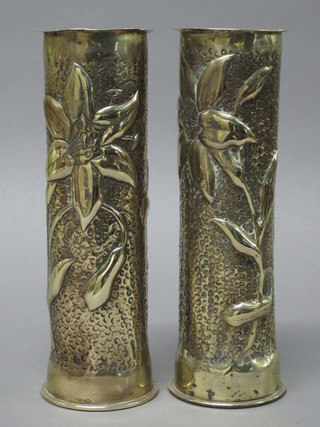 A pair of WWI embossed Trench Art vases formed from shell  cases 10"