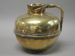 An Eastern brass jug of globular form 12"