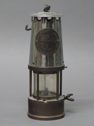 A brass and chrome miner's safety lamp - The Protector Lamp  Type 6, no 9,