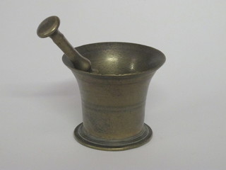A 19th Century brass mortar and pestle 5"