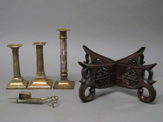 3 various candlesticks, a pair of brass wick trimming scissors and an Eastern hardwood bowl stand
