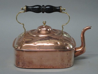A square copper kettle with turned ebony handle