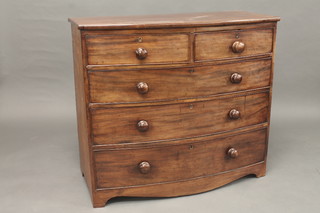 A 19th Century mahogany bow front chest of 2 short and 2 long drawers with tore handles, raised on bracket feet 40"