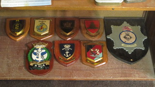 8 various wooden ships plaques