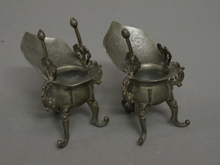 A pair of engraved Eastern metal stands, raised on 3 cabriole supports with seal mark, 5"