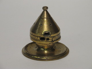 A WWI Trench Art inkwell formed from a nose cone and the  base of an 18llb shell