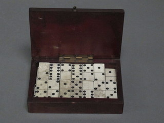 27 various miniature dominoes