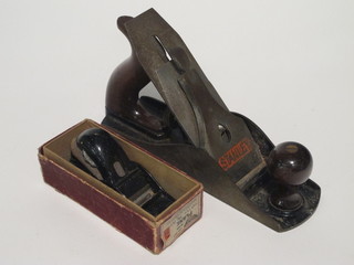 A Stanley Bailey no. 4 1/2 smoothing plane together with a  Miller Falls no.5 plane