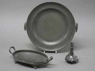 An 18th/19th Century oval twin handled pewter plate warmer,  the base with London touch mark 9 1/2", an oval planished pewter twin handle dish 7" and a pewter bottle frame marked  Palmiers Hyeres